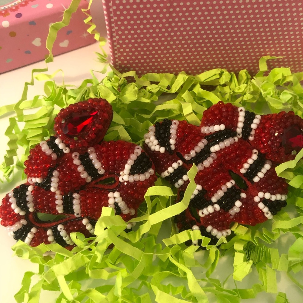 Red and black snake brooch